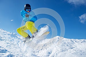 Snowboarder jumping high in the air