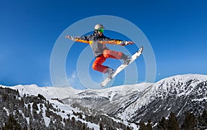 Snowboarder jumping high like ninja