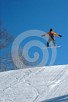 Snowboarder Jumps high