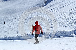 Snowboarder in motion, the snowboarder on the ski slope