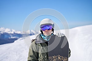Snowboarder with a Mountain Backdrop