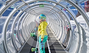 Snowboarder in Mountain Transit Tube