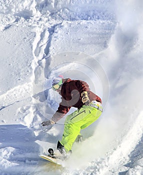 Snowboarder moving down
