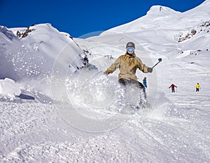 Snowboarder moving down