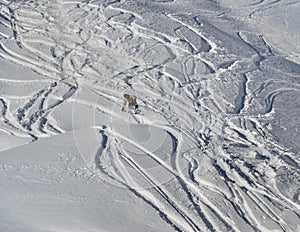 Snowboarder moving down