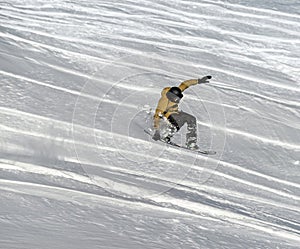 Snowboarder moving down