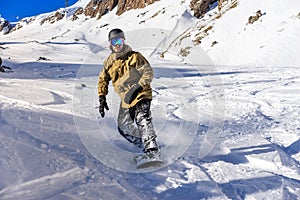 Snowboarder moving down