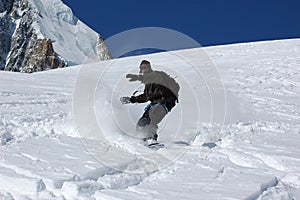 Snowboarder on Mt Blanc