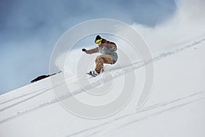 Snowboarder offpiste slope downhill fast photo