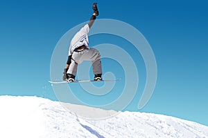 Snowboarder performing jump