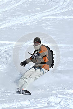 Snowboarder in powder snow