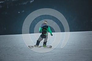 snowboarder rides on the slope. ski resort. Space for text
