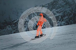 snowboarder rides on the slope. ski resort. Space for text