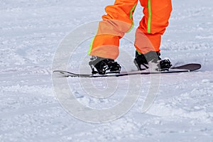 Snowboarder& x27;s feet on the mountain holidays