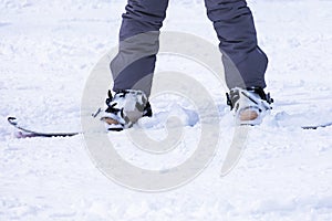 Snowboarder& x27;s feet on the mountain holidays