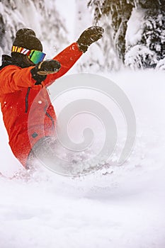 Snowboarder Slashing Deep Powder Snow Close Up