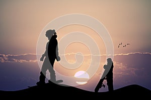 Snowboarder at sunset