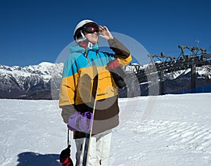 Snowboarder woman in mountains