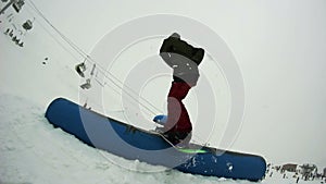 Snowboarding in the cloudy weather