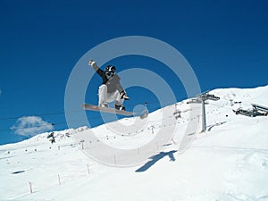 Snowborder (girl) jumping