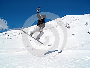 Snowborder (girl) jumping