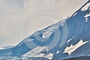 The snowcap glacier covering Snow Dome Mt.  Columbia Icefield Area and the Athabasca Glacier AB Canada