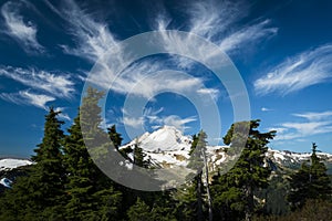 Snowcapped Mount Baker under high cirrus clouds