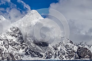 Snowcapped mountains of Elephant island near Antarctica