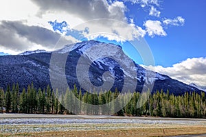 Snowcapped rocky mountains along the highway, Jasper National Parks photo