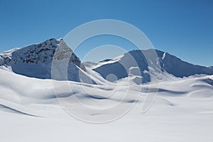 Snowcapped Valbellhorn and Sandhubel mountains near Arosa