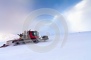 Snowcat with people