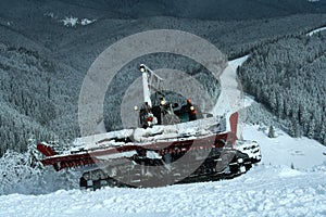 Snowcat on ski slopes