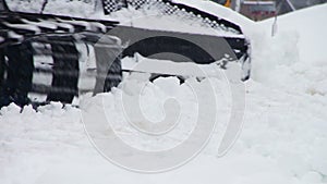 Snowcat works on a mountain slope at the ski