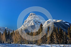 A snowcovered mountains in canadian rockies .Banff , Alberta