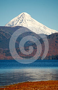 Snowcovered volcano peak in Patagonia photo