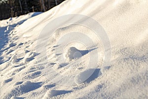 Snowdrift on the side of the road close-up