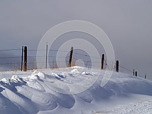 Snowdrifts and Fence photo