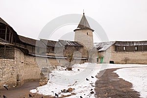 It snowed. It covers an ancient medieval fortress which stands on the banks of the river.