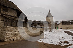 It snowed. It covers an ancient medieval fortress which stands on the banks of the river.