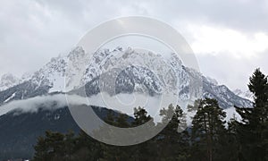 Snowed mountains in puster valley in Italy photo