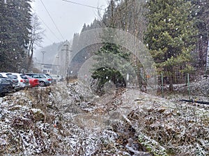 Snowfall in the nature or city during cold winter.