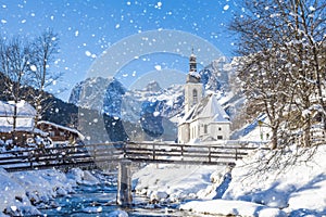 Snowfall in Ramsau, the parish church Saint Sebastian in winter, Ramsau, Berchtesgaden, Bavaria