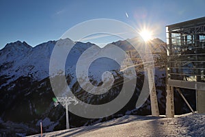 Snowfield and snow covered high alpine mountain peaks