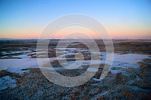 Snowfields in Siberia from helicopter