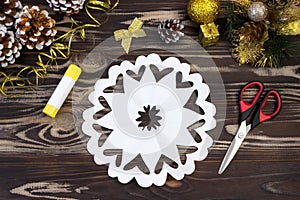 Snowflake ballerina paper. Step-by-step photo instruction. DIY concept. Children`s Christmas and New Year`s crafts. Step 10