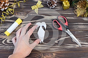 Snowflake ballerina paper. Step-by-step photo instruction. DIY concept. Children`s Christmas and New Year`s crafts. Step 9