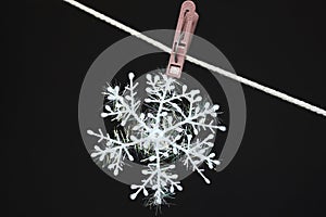 Snowflake on a clothespeg photo