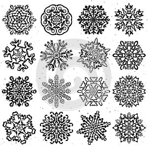 Snowflake hand drawn vectors. Set of 16 isolated elements on white background. Template for christmas winter design