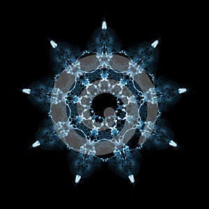 Snowflake pattern isolated on black background. Kaleidoscope effect