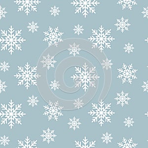 Snowflake seamless pattern. Snow flakes on blue winter background. Abstract wallpaper and gift paper wrap design.